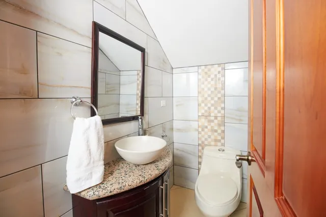 Ground-floor bathrooms (2 & 3) — The Main House, Bella Vista Private Resort Costa Rica